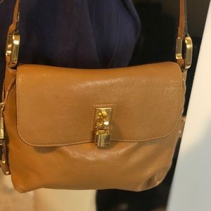 Leather tan ladies purse.